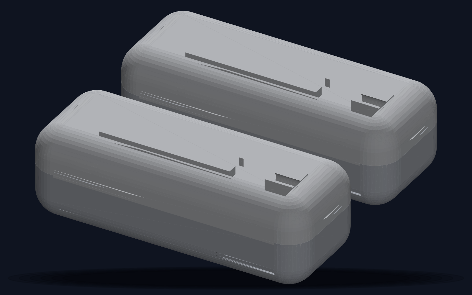 Two 3D-printed EMDR tapper pods side by side